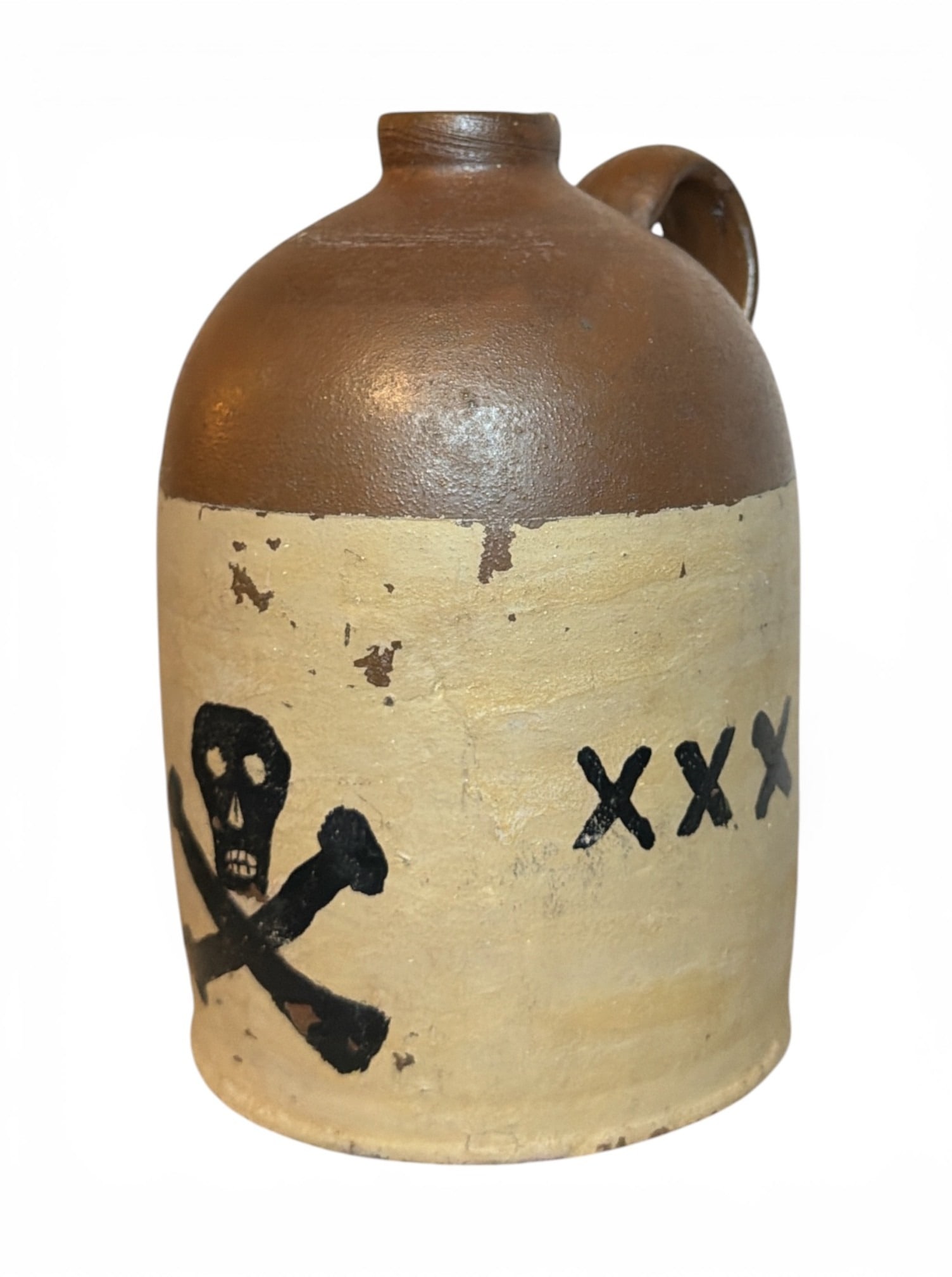 Old Folk Art Moonshine XXX Crock Jug: Measures 7.5" H x 4.75" diameter x 6" W including handle. Features skull and crossbones and triple x. "Drink Me, Waddy DDT" written to bottom. This is an authentic folk art moonshine jug