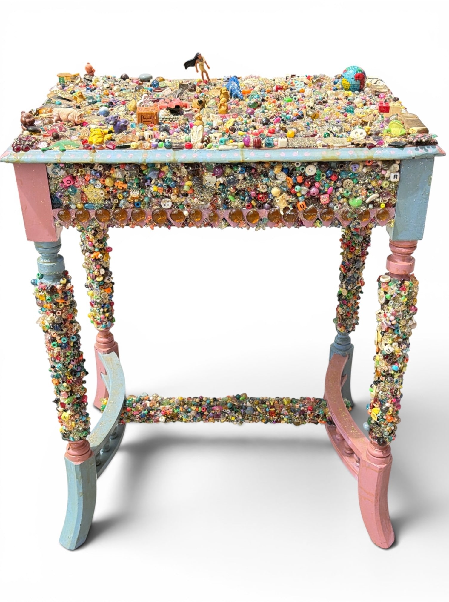 Folk Art Assemblage Table: Measures 32" H to Pocahontas' head, 29.5" H to the table top x 23.5" W x 16" D.