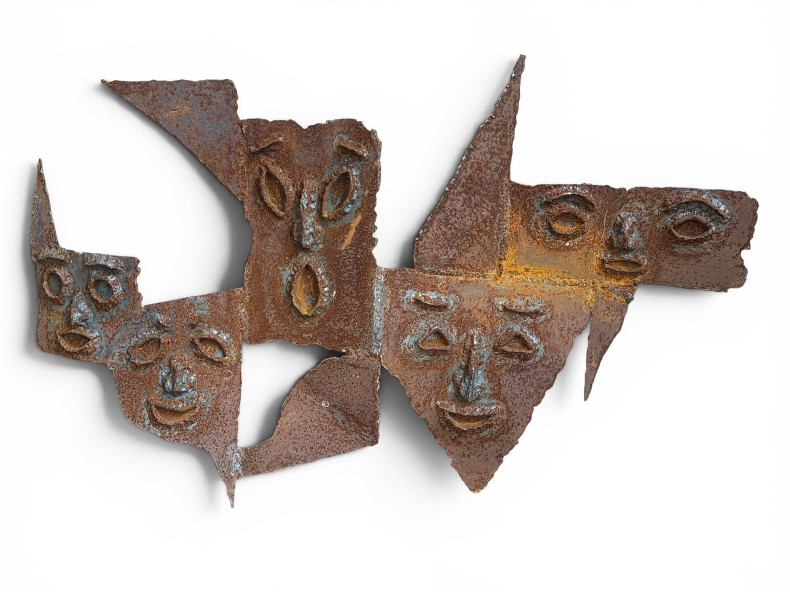 Brutalist Metalwork Face Sculpture: Measures 18" H x 29" W x 1.5" D.