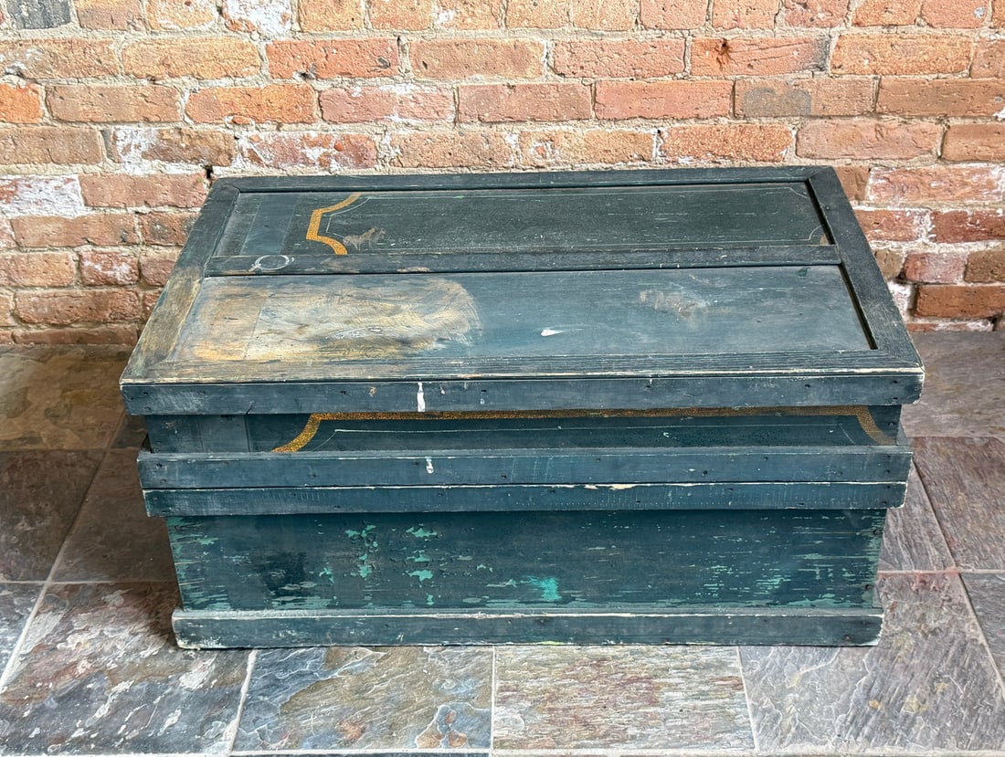 Exceptional Old Blue Paint Folk Art Trunk: Measures 16" H x 35" W x 21.5" D This old blue paint trunk was/is an original primitive trunk that someone added additional found blue with yellow paint boards to create more of a tool chest. All