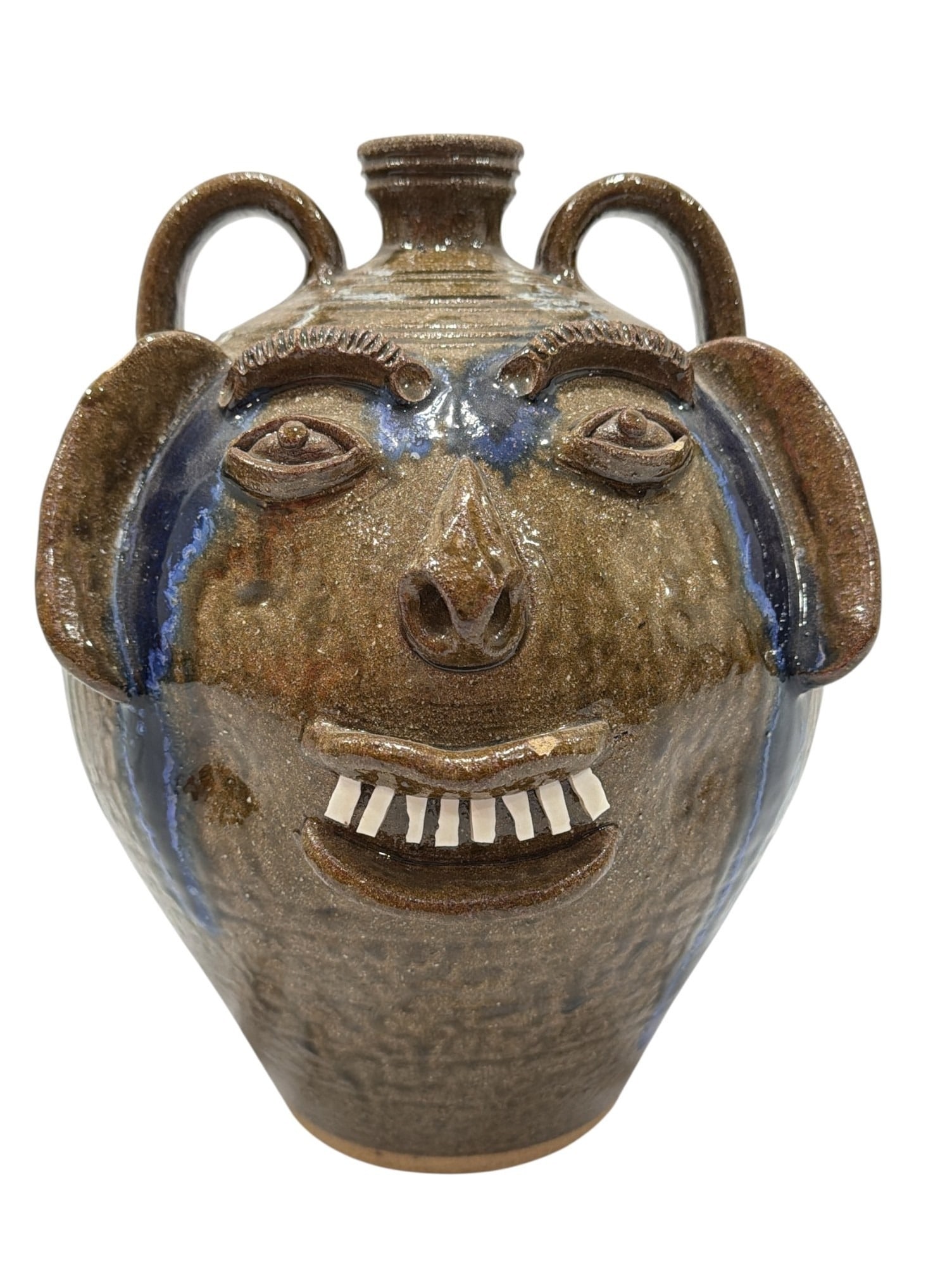 Folk Art Ugly Face Jug, A.V. SMITH: Measures 11" H x 9" overall diameter. Signed on the bottom.