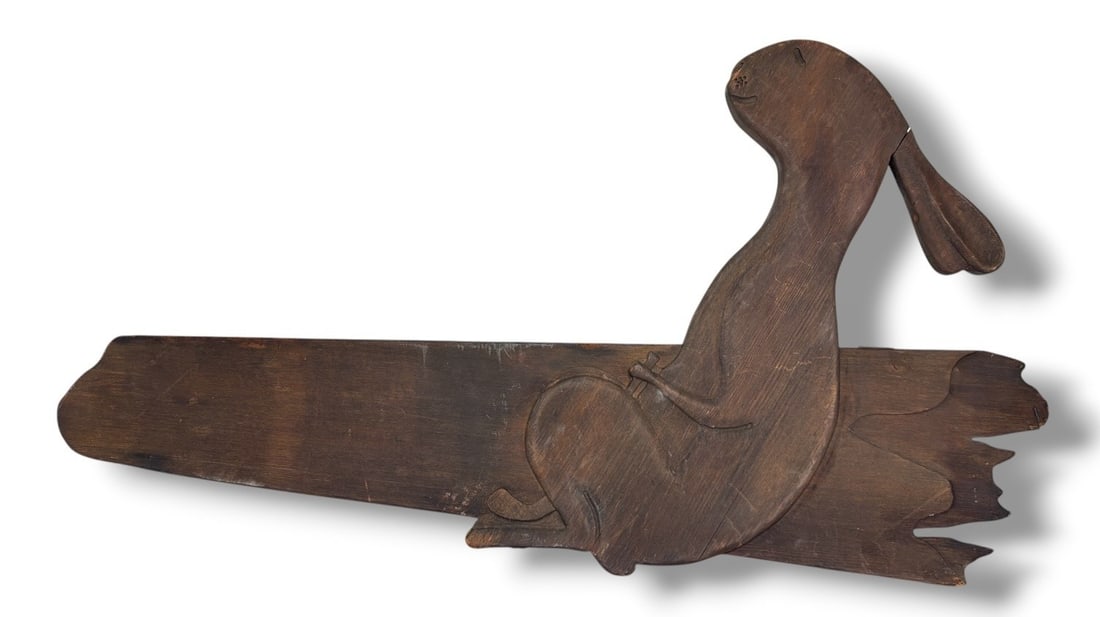 Folk Art Carved Wood Rabbit Weathervane Top: Measures 25.5" H x 45.5" W x 1.5" D. Retains a plaque that reads "Michael D. Paulk". Retains a pole to be mounted as a weathervane in addition to wires for hanging.