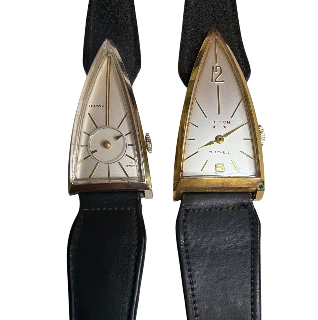 Two 1960's HILTON 17 Jewel Triangle Case Watches: Larger one measures total length of 8" but adjustable, watch face measures 2" x 1". Smaller measures total length of 8", watch face measures 1.75" x .75". Property from the Collection of Marjorie and