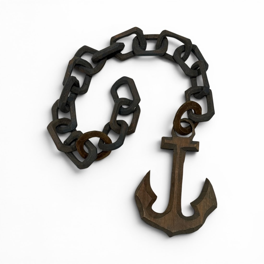 Nautical Folk Art Hand Carved Anchor & Chain: Carved wood. Measures 26" L overall with each chain measuring around 2" x 1.5". Anchor measures 6" x 4".