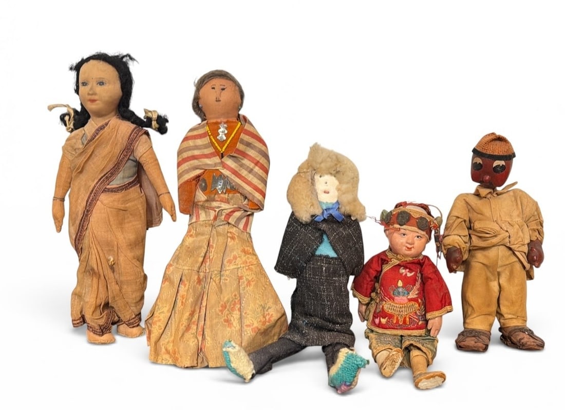 Collection of Early International Dolls: Includes a doll from India, Mexico, China, a folk art doll, and a Native American doll. Property from the Collection of Marjorie and Harvey Freed.