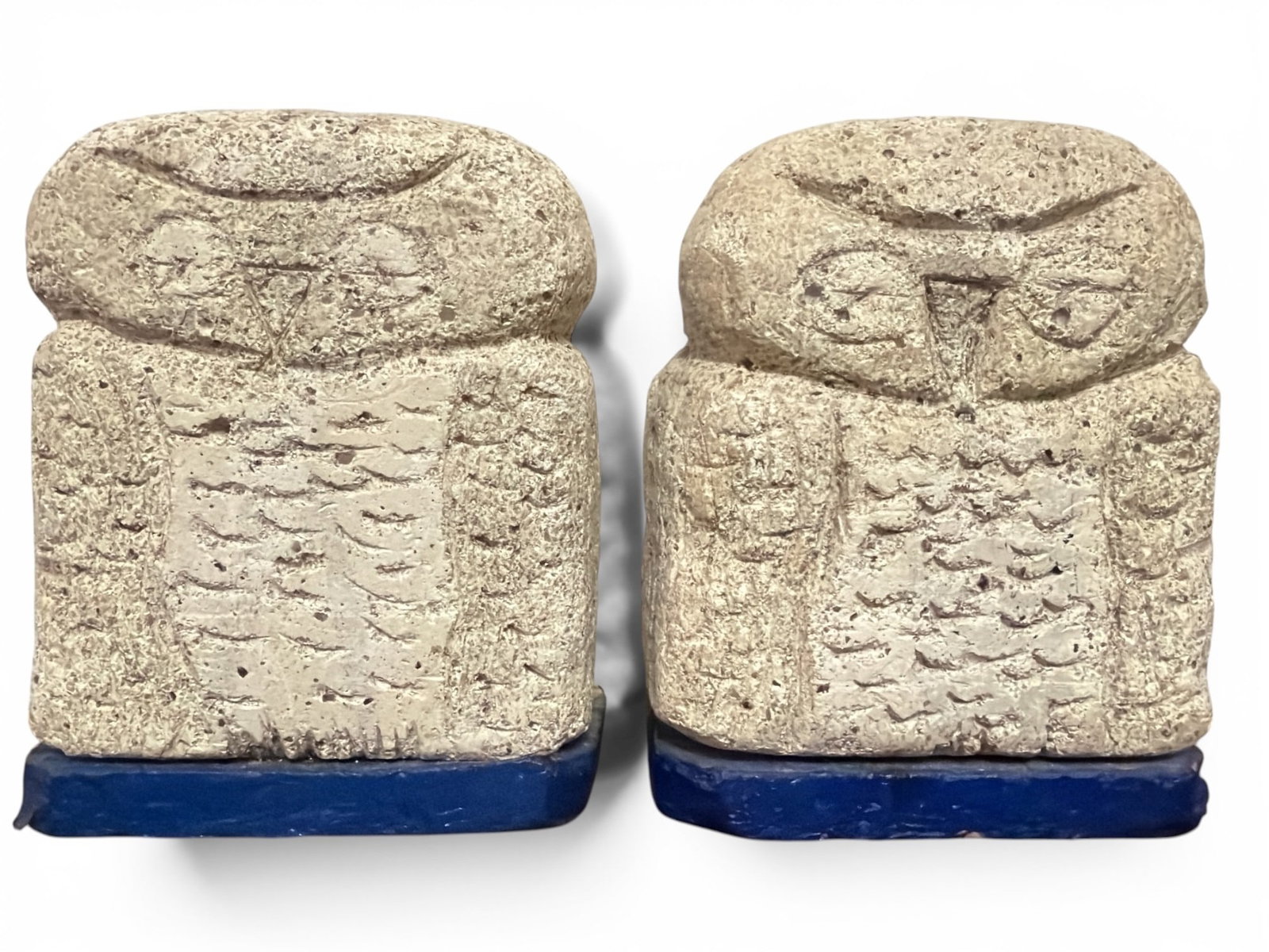 Mid Century Folk Art Carved Stone Owl Sculptures: Both measure 5" H x 4"W x 2"D. Possibly pumice stone, mounted on painted blue composite board bases.