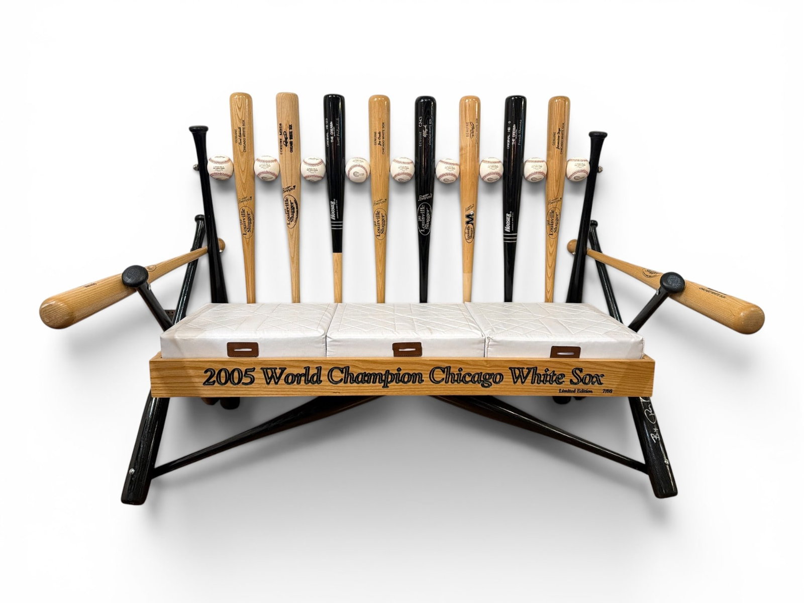 2005 Chicago White Sox World Series Champions Baseball Bench, RON KITTLE: Baseball and baseball bat for the 2005 Chicago White Sox's World Series Championship crafted bench by former outfielder Ron Kittle. Measures 40" h to back x 20" H to seat x 53" W x 34" D. Signed and d