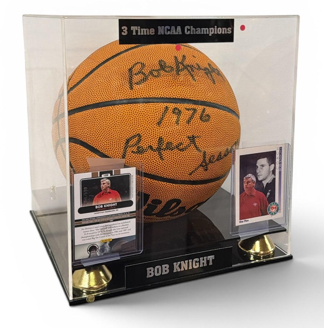 Authentic Autographed BOB KNIGHT Indiana University 1976 Season Basketball: Includes the signed 1976 "Perfect Season" signed basketball with a holographic Schwartz Sports Memorabilia holographic sticker and certificate of authenticity card, a 1992 Star Pics card, and a Panini