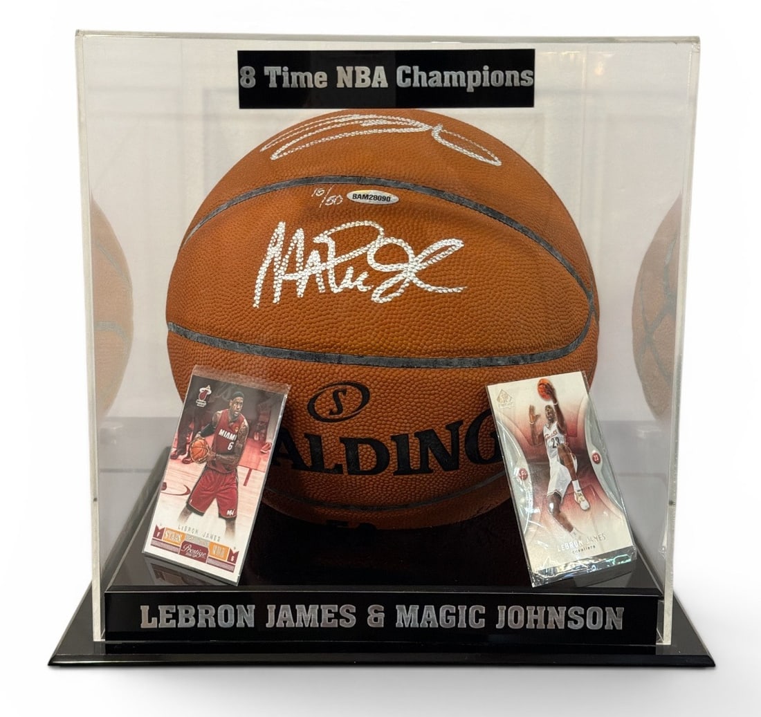 Authentic Autographed MAGIC JOHNSON LEBRON JAMES Basketball w/ COA: Autographed official Spalding basketball by Magic Johnson and Lebron James as they are both 8-time NBA champions. Limited edition number 16/50. Retains holographic sticker from Upper Deck and comes wi