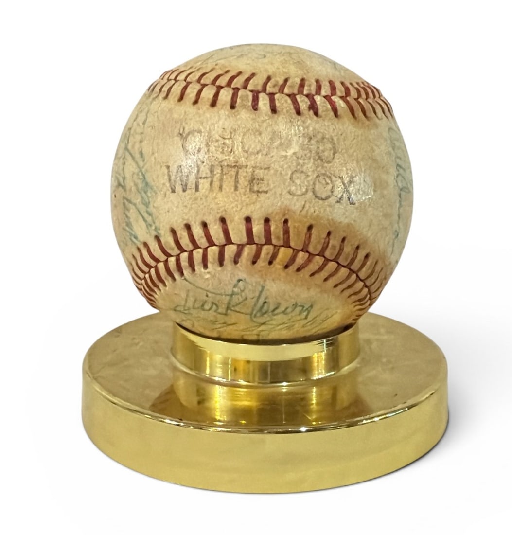 Team Autographed CHICAGO WHITE SOX 1959 Baseball: Chicago White Sox team signed baseball from 1959. Names signed in blue ink and the baseball itself is stamped "Chicago White Sox". Signatures include Rudy Arias, Barry Latman, Turk Lown, Ray Moore, Bi