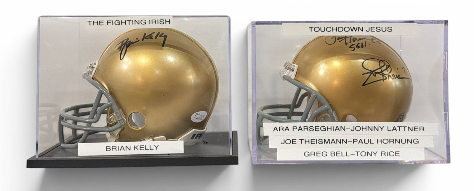 Two Authentic NOTRE DAME Football Autographed Mini Helmets w/ COA: Includes a Brian Kelly signed helmet and a helmet signed by Ara Parseghian, Johnny Lattner, Greg Bull, Tony Rice, Joe Theismann, and Paul Hornung that retains a COA from Athlon Sports. Both helmets re