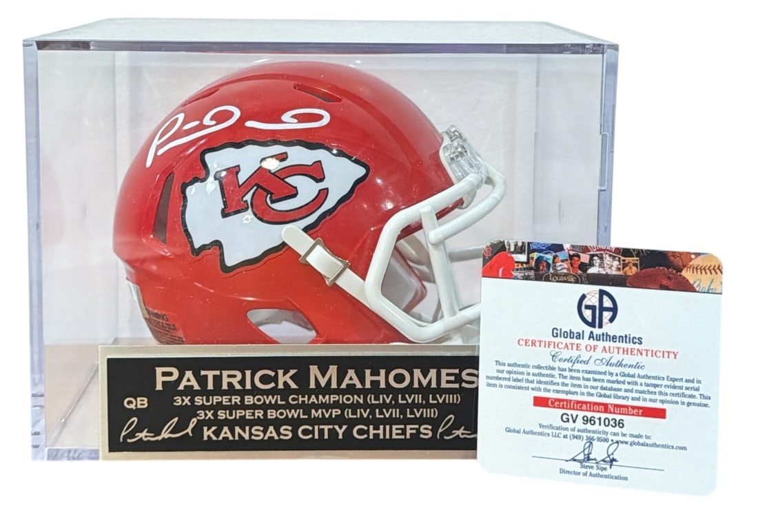 Autographed PATRICK MAHOMES Kansas City Chiefs Mini Helmet w/ COA: Autographed Patrick Mahomes mini helmet in plastic display case with Global Authentics holographic authentication sticker and COA card. Case measures 5. 5" H x 5. 5" W x 7. 25" D.