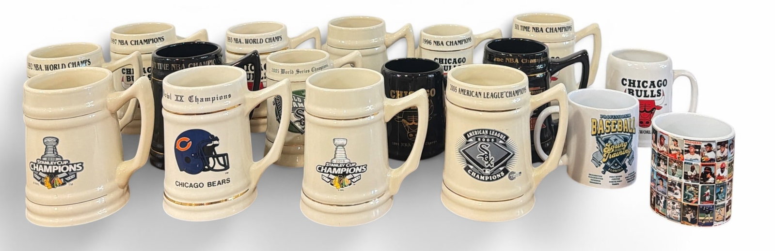Collection Chicago Sports Championship Commemorative Beer Steins: Includes Chicago Bulls NBA Champs, Chicago Blackhawks Hockey Stanley Cup Champions, and Chicago White Sox World Series. Some retain holographic authentication stickers. Largest measure approx. 6" H x 