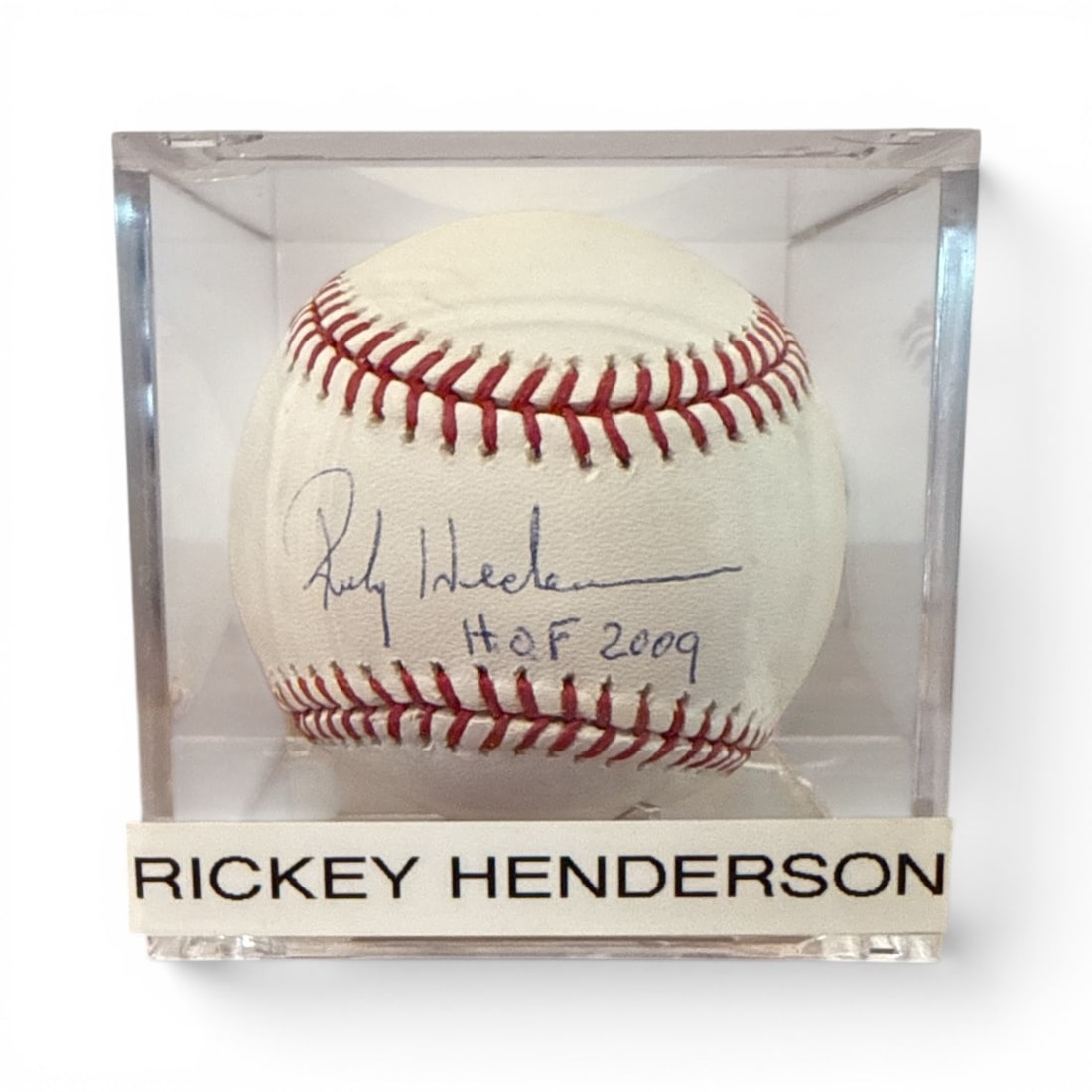 Autographed RICKEY HENDERSON Baseball: Comes with Mounted Memories COA and hologram sticker.