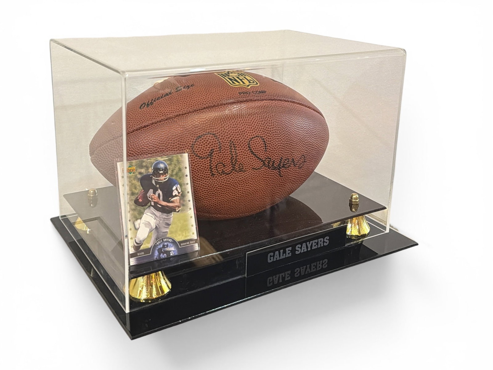 Autographed GALE SAYERS Chicago Bears Football: Includes the signed football and a Gale Sayers Upper Deck #81 card. Case measures 8. 5" H x 13" W x 10" D.