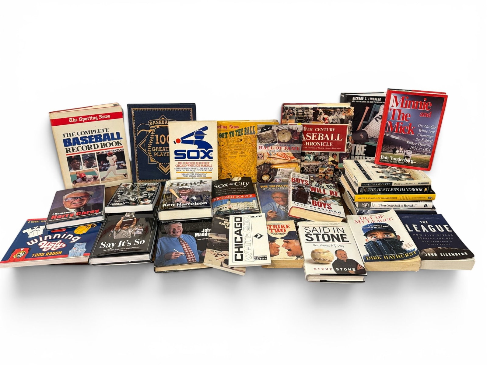 Collection Baseball and Chicago Sports Coffee Table Books/Novels: Lot includes 20+ hard and soft cover books with subjects on the Chicago White Sox, Chicago Sports, baseball, Harry Caray, information guides, and Hall of Fame.