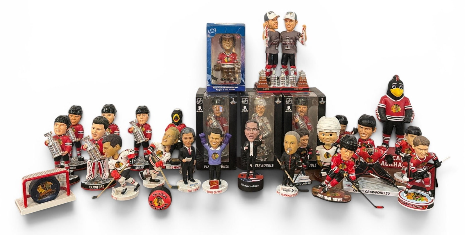 Large Collection CHICAGO BLACKHAWKS Bobble Heads, Statues, Memorabilia: Mostly all bobbleheads. Includes Toews, Kane, Chelios, Sharp, Crawford, Bedard and more. Several 2013 and 2015 Champion bobbleheads that are numbered editions. Patrick Kane and Jonathan Toews 3 cup bo