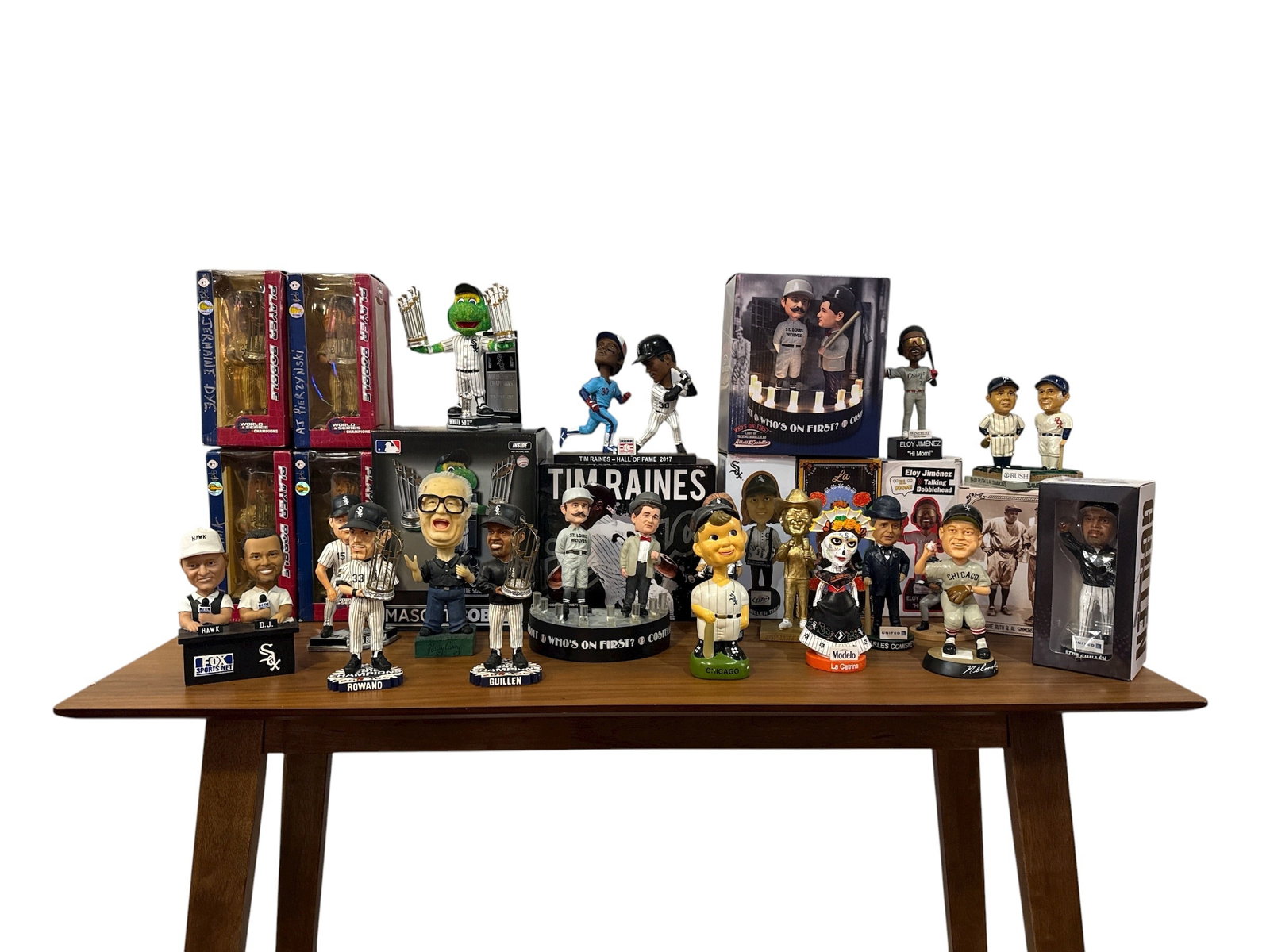 Collection of CHICAGO WHITE SOX Baseball Bobble Heads: Mostly bobbleheads. Includes but not limited to Scott Podsednik, Luis Aparicio, Paul Konerko, Harry Caray, Hawk Harrelson, Darren Jackson, Tim Raines, Charles Comiskey, etc. Assorted sizes.