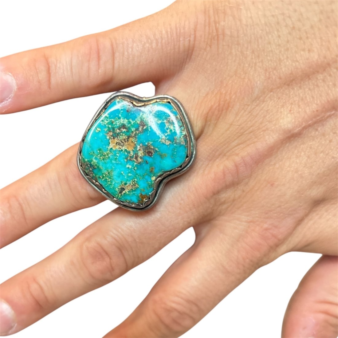 Incredible MARK CHEE (Dine/Navajo, 1914-1981) Sterling Silver & Turquoise Ring: Matching turquoise and sterling silver ring by Navajo silversmith Mark Chee. Marked on the back Includes intricate silver work with a chunky turquoise stone. Ring size is 8.5 Turquoise measures 1.5 in