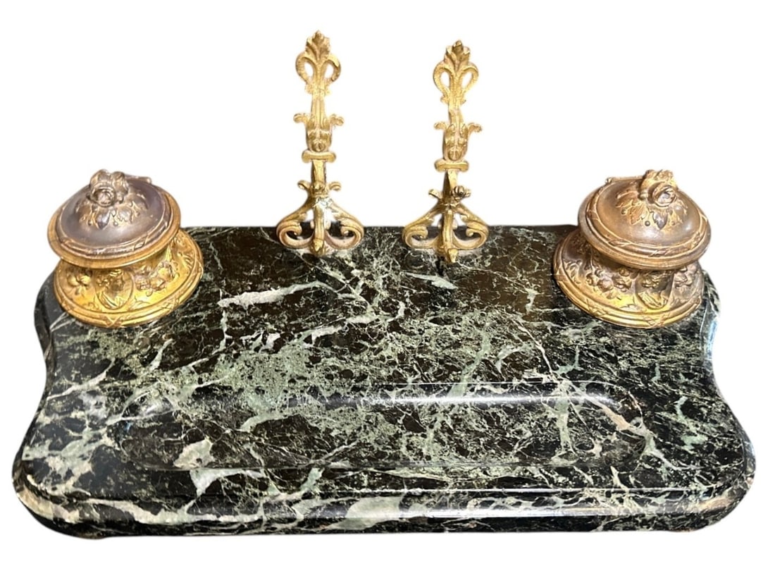 French Rococo Marble and Brass Double Inkwell: Measures 6.5" H x 14" W x 6.5" D. Marked France on the bottom, likely came into the US between 1890-1913.