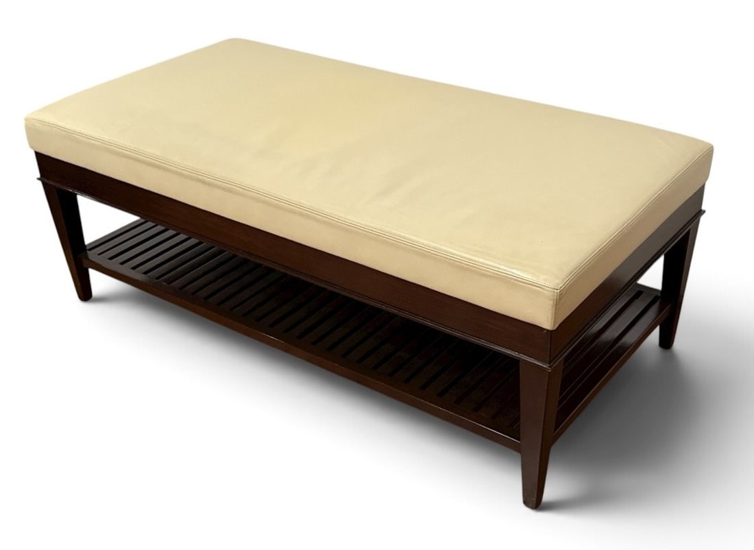 An A.RUDIN Leather and Wood Bench: Model No. 652. Measures 18.25" H x 48" W x 24"D. Label attached to underside.