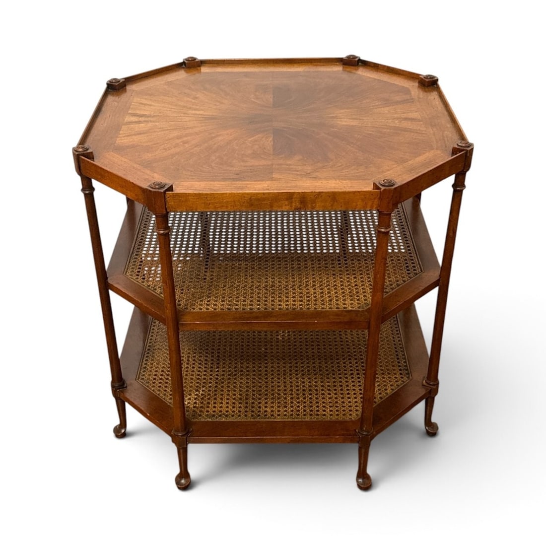 BAKER Flamed Walnut & Cane Octagonal Table: Three-tiered. Measures 25" H x 26" W x 26" D.