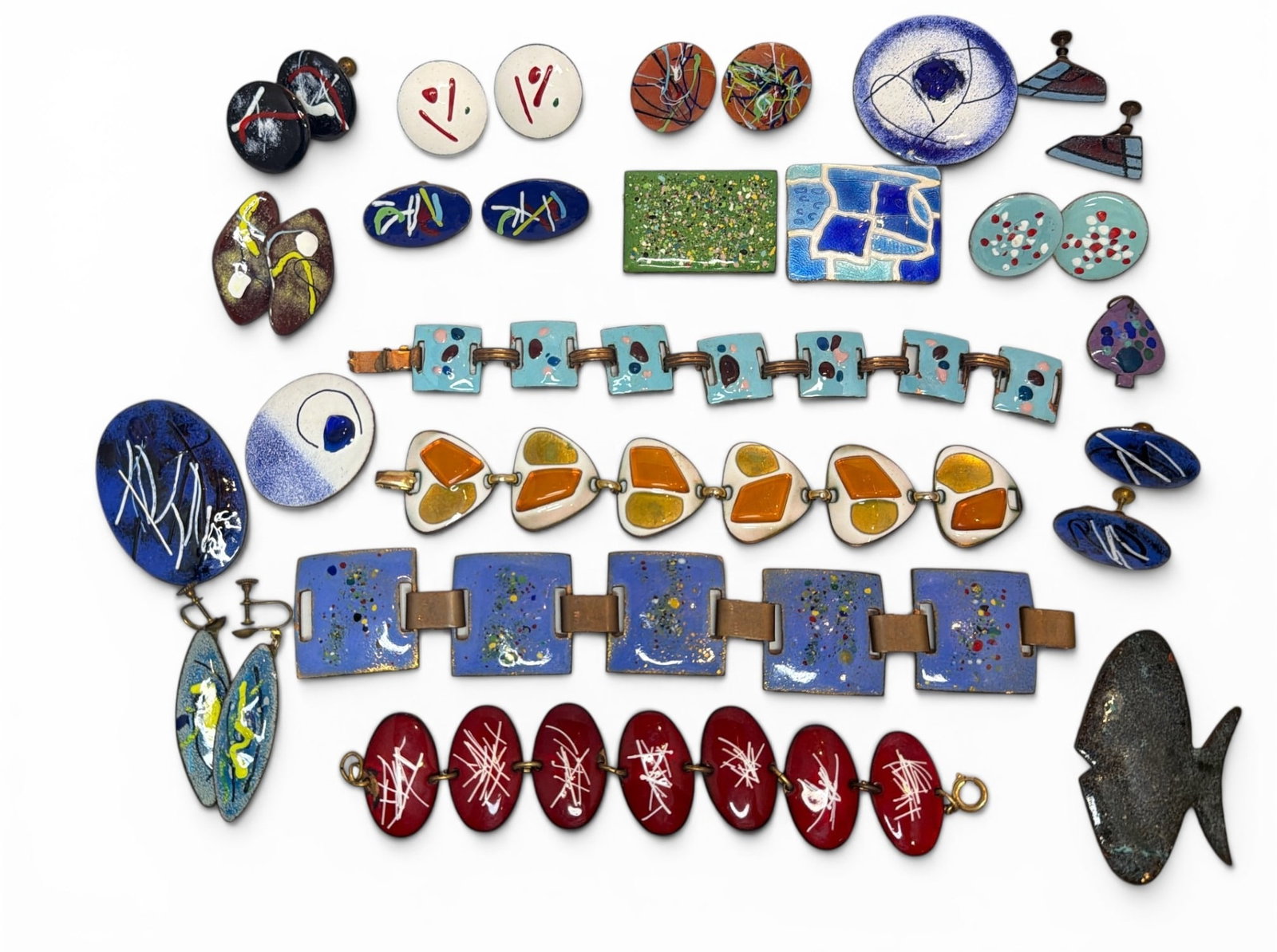 Collection Mid Century Modernist Copper Enamel Jewelry: Includes bracelets, earrings with screw backs, and assorted pins. Longest bracelet measures 8" L.