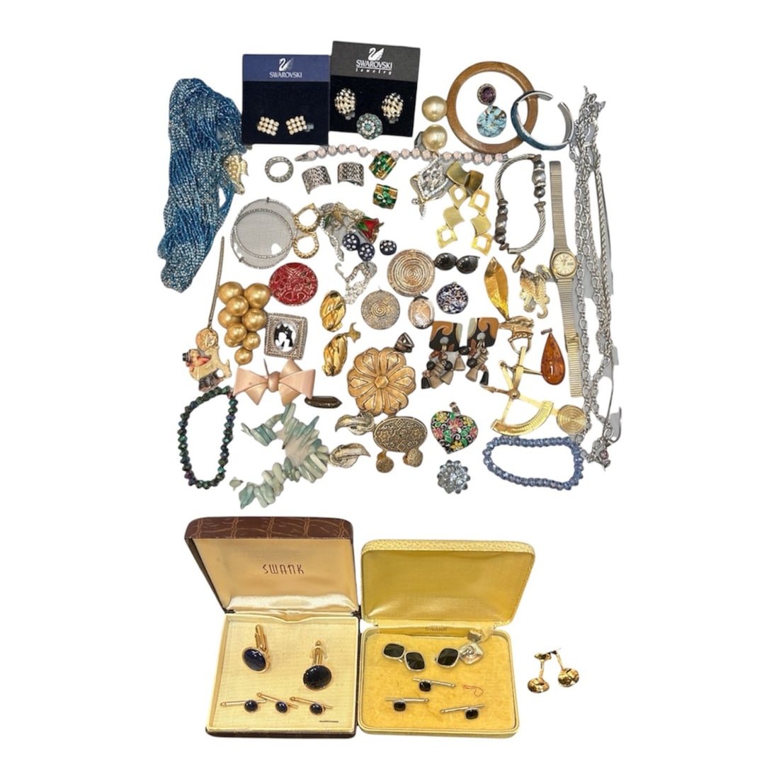 Collection Vintage Designer Jewelry, SWANK, SWAROVSKI: A collection of vintage costume jewelry including Swank and Swarovski