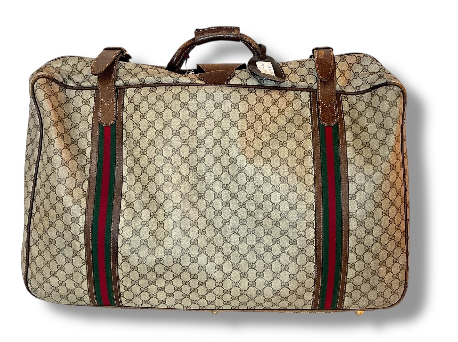 Vintage 1970s GUCCI Monogram Canvas Suitcase: Measures 19" H x 28" W x 8.5" D, 4" handle drop.