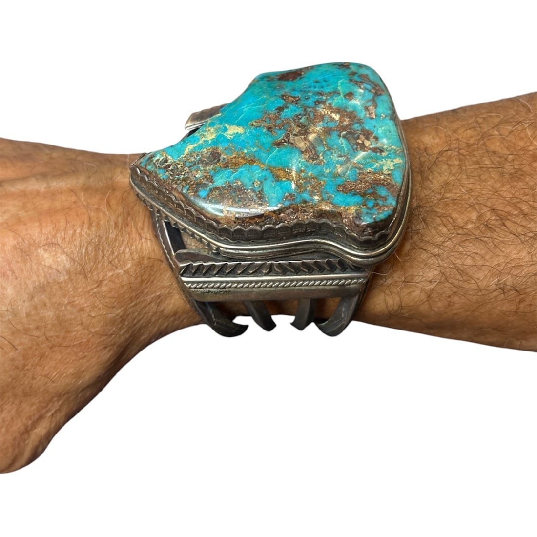 Incredible MARK CHEE (Dine/Navajo, 1914-1981) Sterling Silver & Turquoise Cuff: Massive turquoise and sterling slider cuff by Navajo silversmith Mark Chee. Includes intricate silver work with a large turquoise stone with beautiful veining. Piece measures 2.25" x 2.27" on the cuff