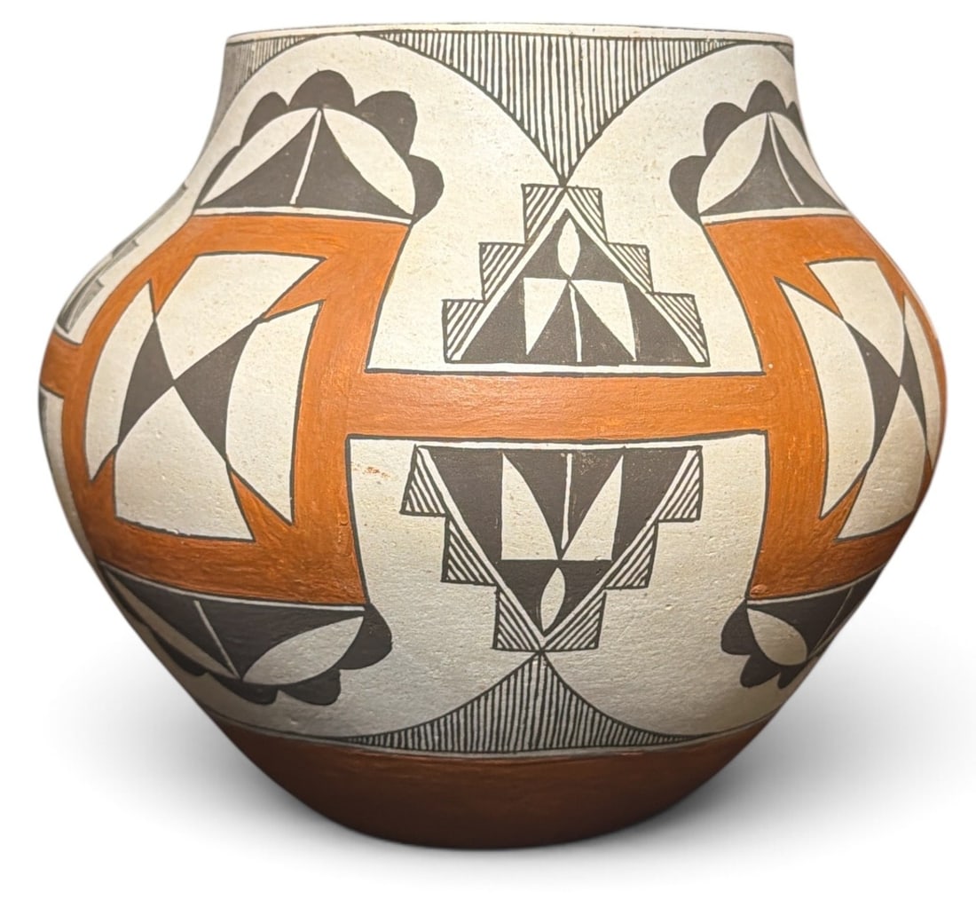 EVELYN CHEROMIAH (Native American, Laguna Pueblo, NM, 1928-2013) Polychrome Vase: Measures approx. 7" H x 8" overall diameter.