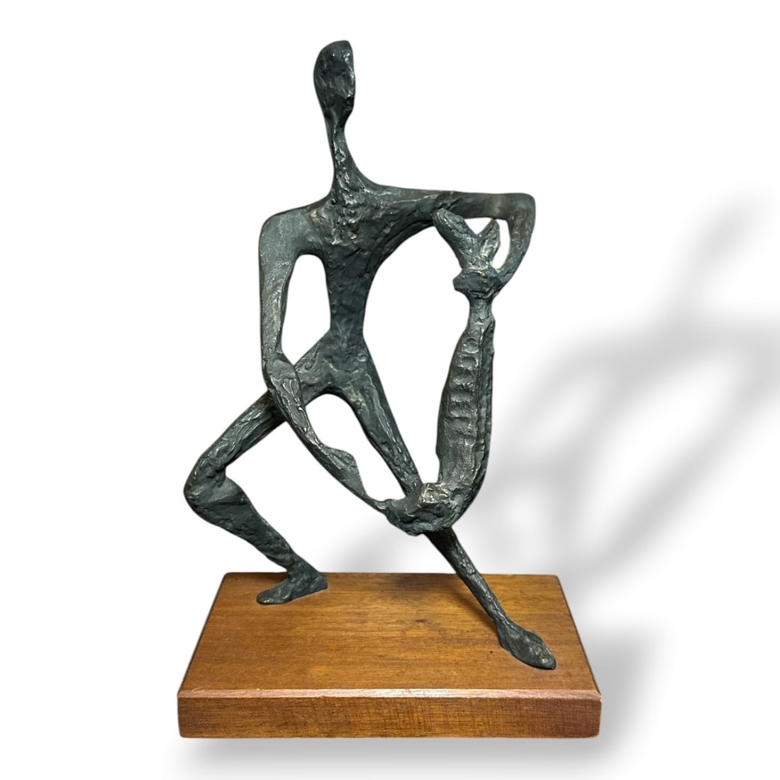 SIMON GORDON (American, 1908-1961) Metalwork Sculpture of Man With Fish: Signed on the bottom. Measures 13.5" H x 8" W x 5" D.