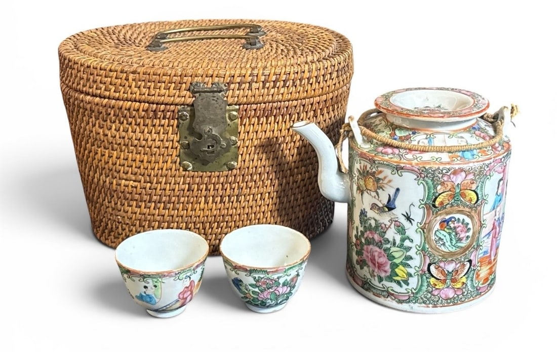 Antique Chinese Rose Medallion Familie Rose Teapot Set in Basket: Porcelain. Circa late 19C. Consists of a teapot with lid & 2 teacups set inside a formed handmade woven basket. Basket measures 6.75" H x 10" W x 7.5" D Teapot measures 6.25" H including lid