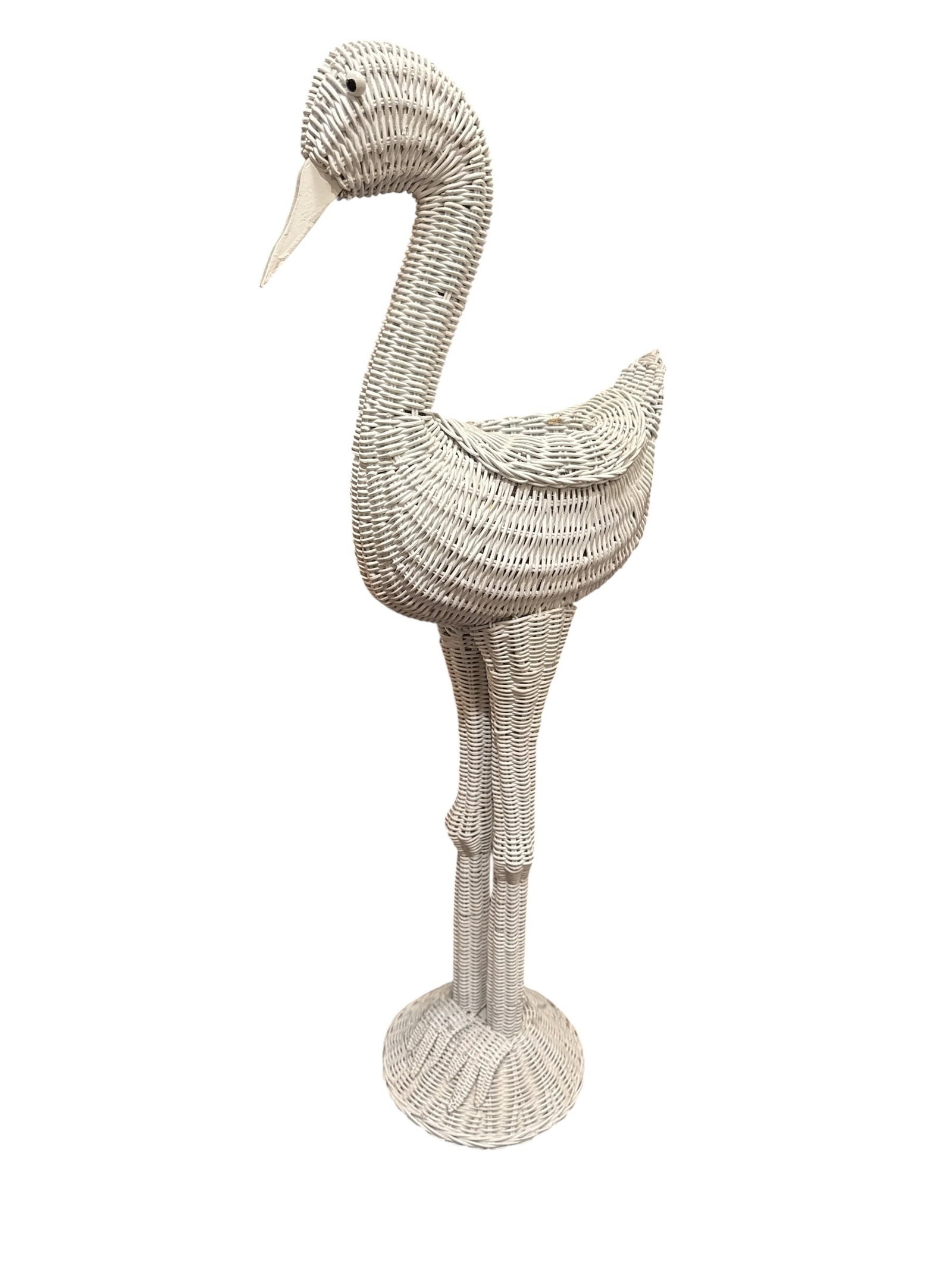 Antique Painted Wicker Flamingo Plant Stand: Measures 37" H x 14" D X 6" W at the body-8.5" Dia. base. Wicker body, wood eyes & bill. Set on a wood base.
