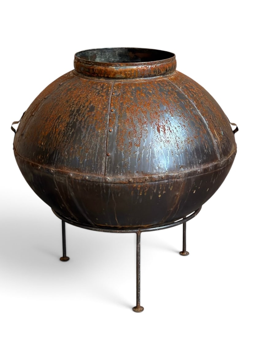 Modernist Stell Garden Planter on Stand: Riveted metal planter with iron tripod base. Measures 24" H x 21" diameter.
