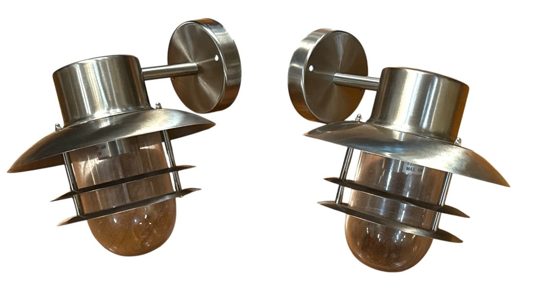 Danish/Scandinavian Modernist Style Wall Sconces: Stainless steel design, glass globe. Measures 9" H x 8.5" Dia.