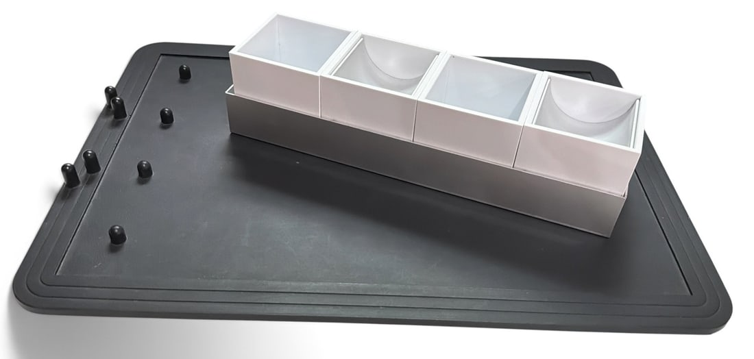 ENZO MARI (Novara 1932 - Milano 2020) and BRUNO MUNARI (Milano 1907 - 1998) For DANESE MILANO Desk: Lot includes Bruno Munari for Danese Milano Canarie Desk Set, 1957 that measures 2.5" H x 9.75" W x 2.5" D. Enzo Mari for Danese Milano 1990 notepad that measures 12.75" x 10.25".