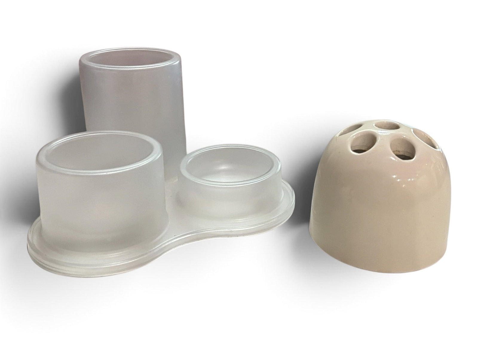 EMMA GISMONDI SCHWEINBERGER (Italian, 1934-2019) For ARTEMIDE & JASPER MORRISON (English b.1959) For: Includes an Emma Gismondi for Artemide pen holder that measures 3.25" H x 3.75" diameter and a Jasper Morrison for Magis desk organizer that measures 4.25" H x 7.5" W x 7.5" D.