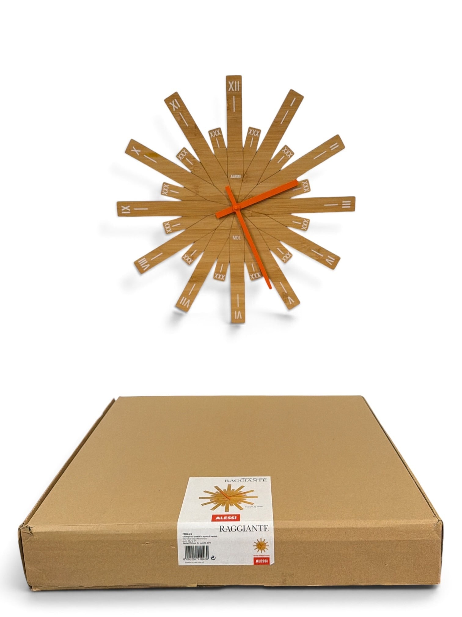 MICHELE DE LUCCI for ALESSI Raggiante Wall Clock: Bamboo clock. Clock has overall diameter of 19". Box measures 4" x 21" x 21". Includes original box.