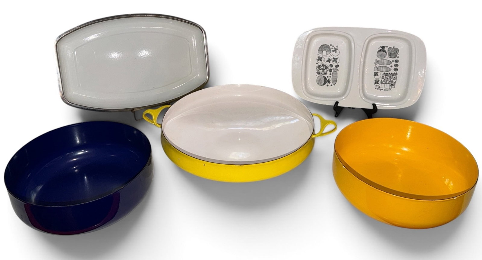 Collection of Danish Enamelware Kitchen Articles: Includes a Dansk Kobenstyle yellow paella pan that measures 3.5" H x 17.5" W handle to handle x 13.5" overall diameter, a Georges Briard separated enamelware dish, a Cathineholm Norway enamel serving 