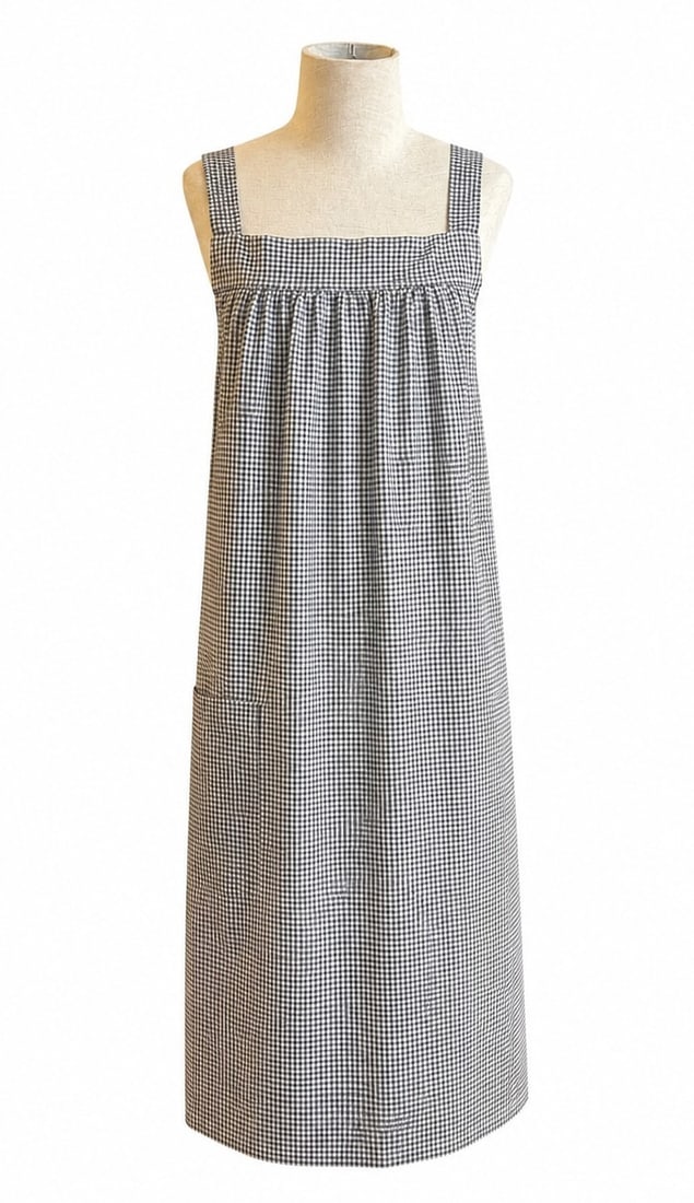 1800s Era Primitive Gingham Apron Pinafore: Cotton. Measures 42" from shoulder to hem, 25" from armpit to armpit with and open back.
