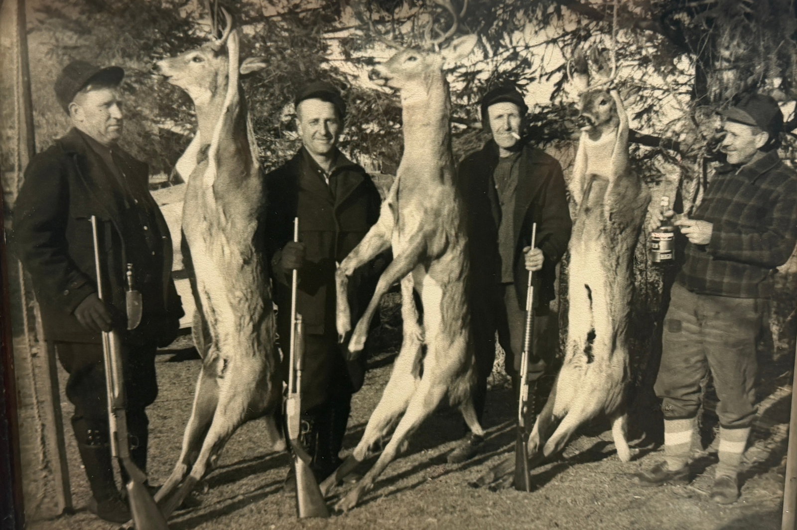 Early 20th C Deer Hunting Trophy Photograph: Frame measures 10.75" H x 12.75" W, sight measures 7.5" x 9.5". depicting 3 deer
