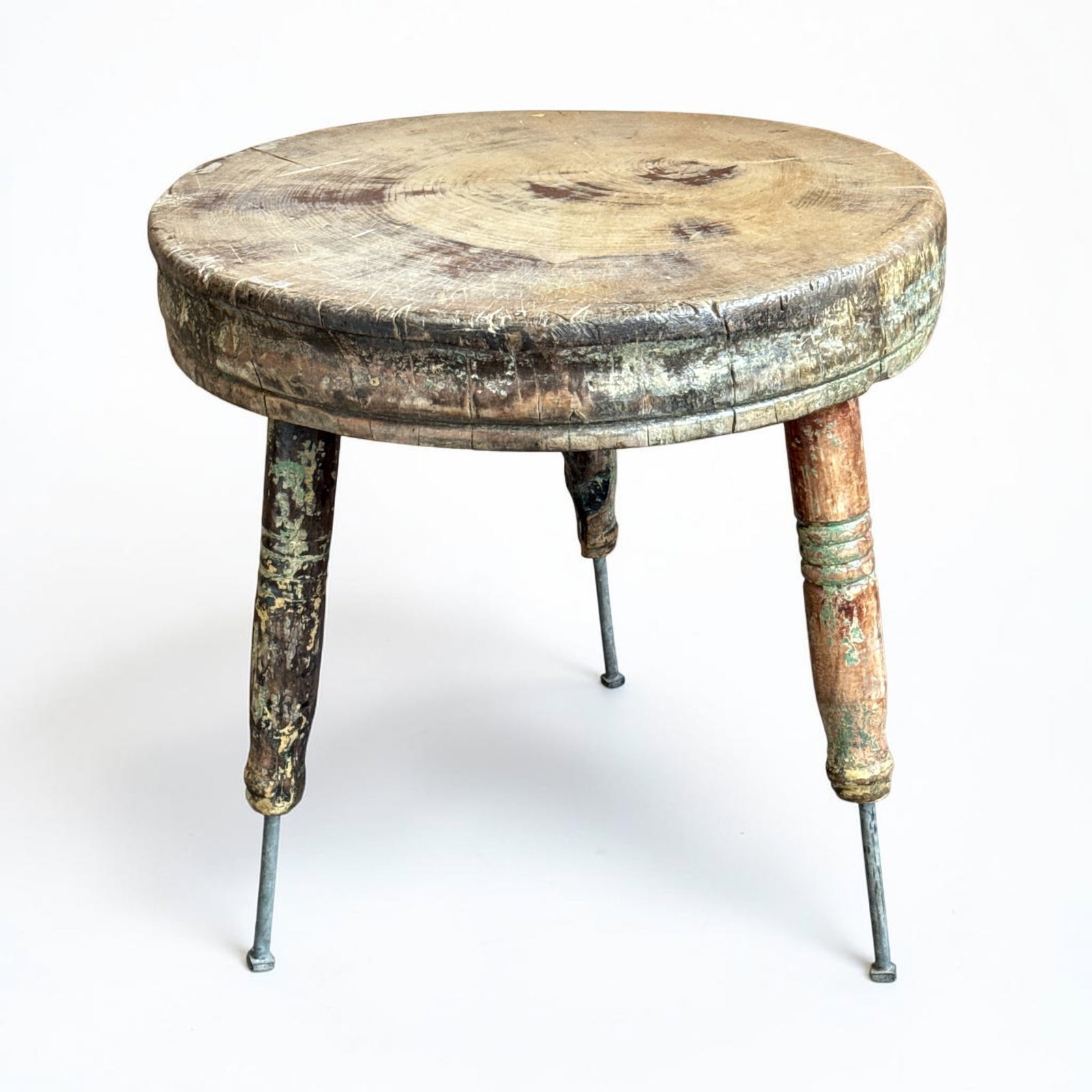 Large Primitive European Butcher Block Table: Steel enforced tripod legs, butcher block top. Measures 34" H x 35" overall diameter at the top.