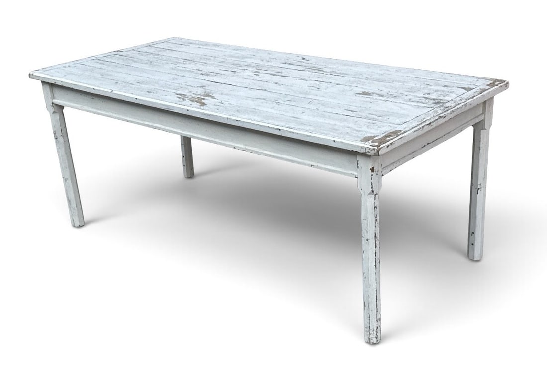 A White Farmhouse Harvest Table: Measures 30" H x 72" W x 34" D.