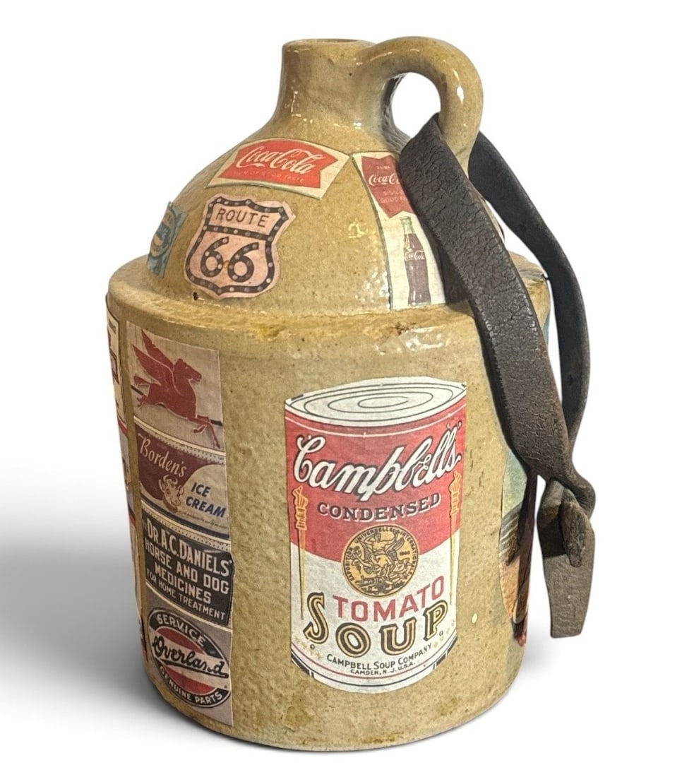 POPS CASEY (American, 20th C.) Folk Art Americana Jug: Features classic Americana advertising. Measures 8.5" H x 6" overall diameter. Signed "Pops Casey U. S. A. " on the bottom.