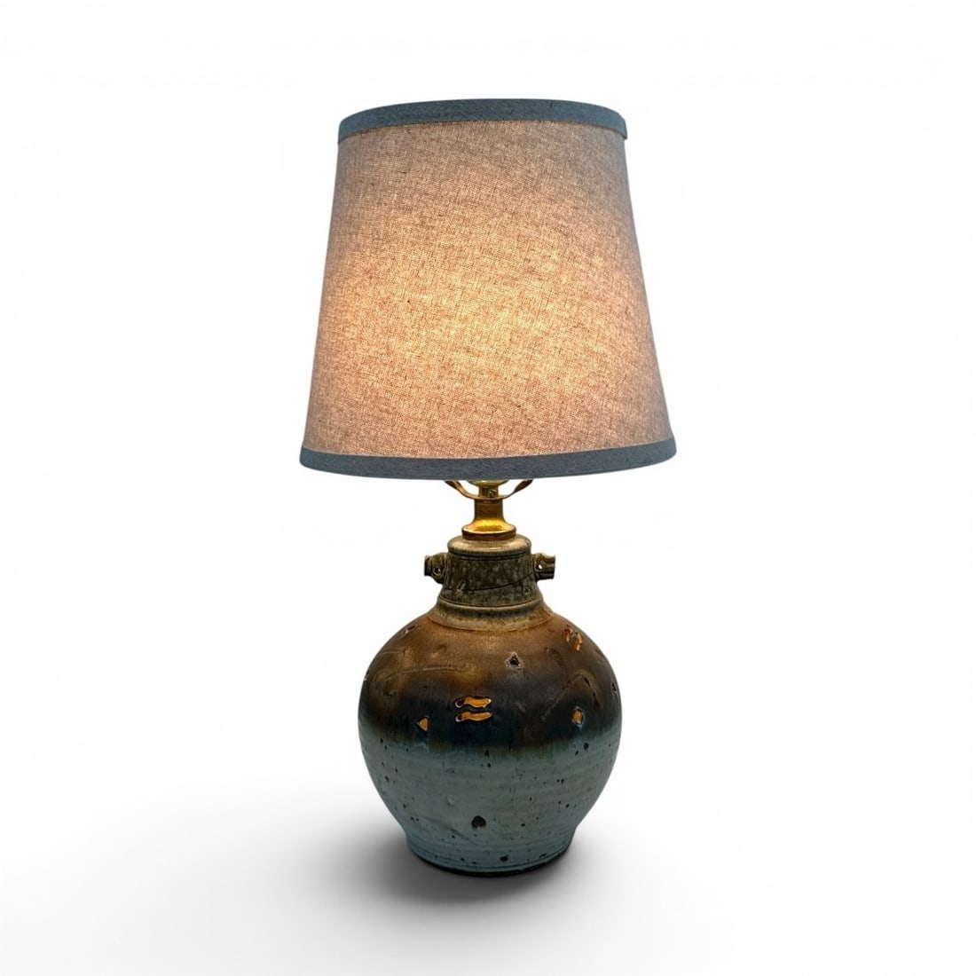 WALLY SMITH (American) Craft Art Pottery Lamp: Circa 1970 - 2000. Features Smith's identifying thumb stops and 3 light settings - main light, base light or both.20" H x 7.5" base diameter x 10" shade diameter. Signed on bottom side.