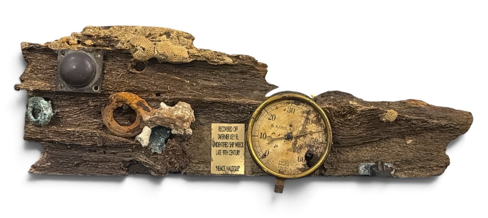 Salvaged Shipwreck Timber w/ Pressure Gauge: Measures 9.5" H x 27" W x 4" D. Plaque reads "Recovered off Tavernier Key, Florida Unidentified Shipwreck, Late 19th C. ".