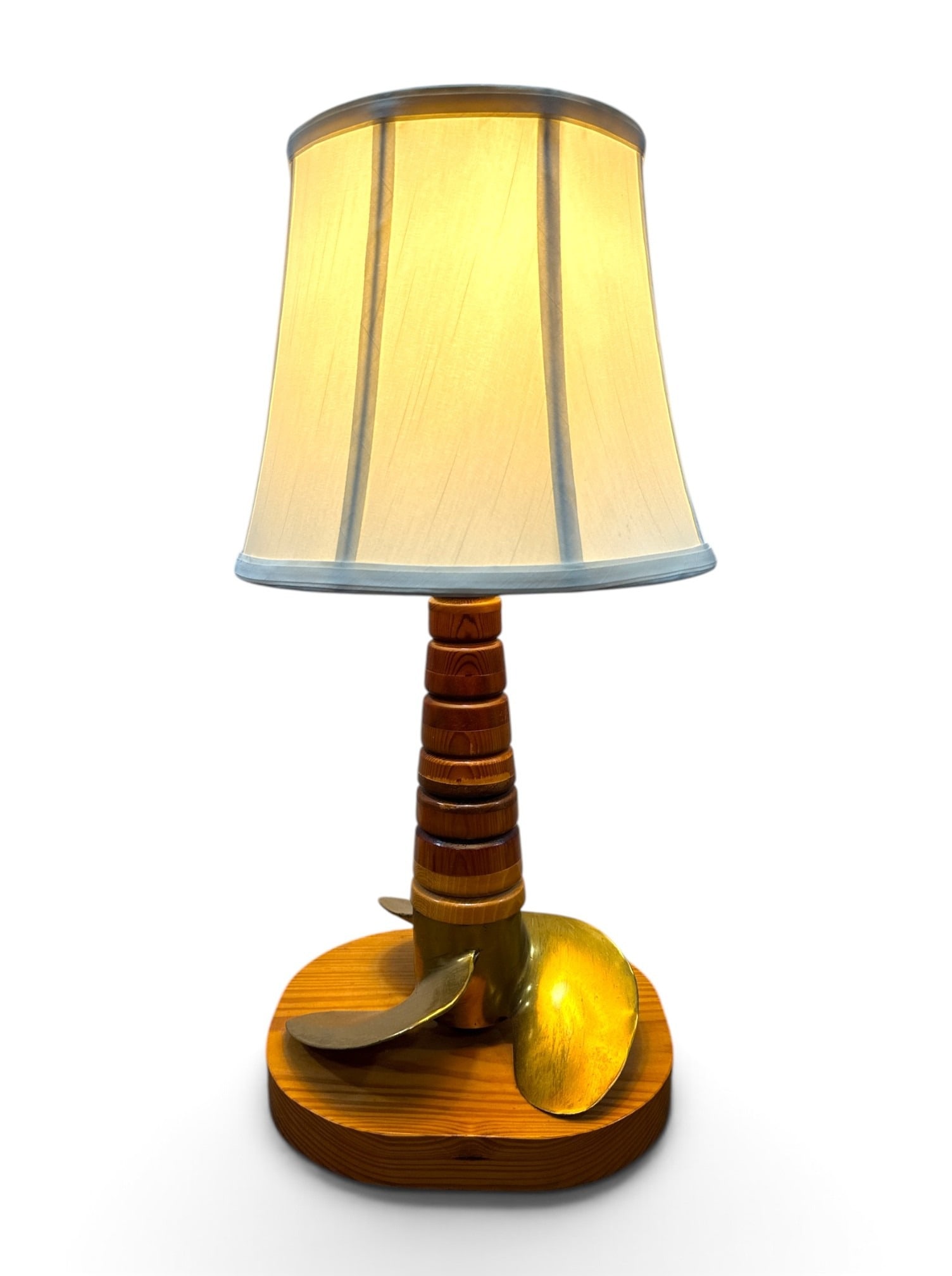 Nautical Folk Art Propeller Lamp: Cedar wood with metal propeller. Measures 23" H x 11" W x 9.5" D.