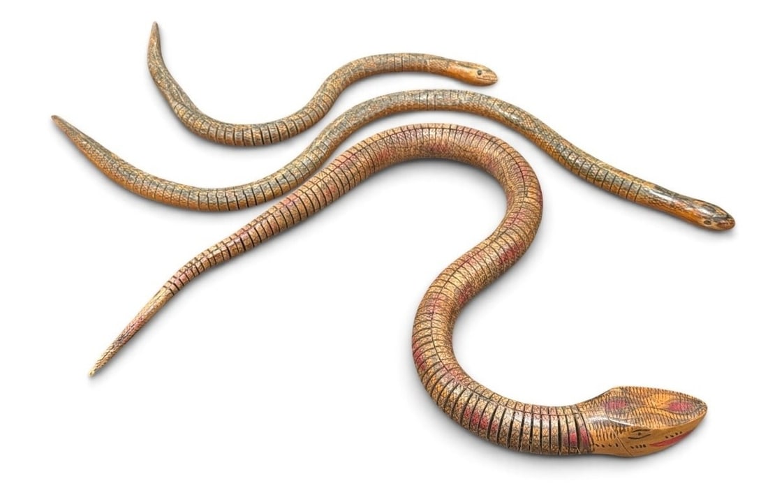Three Folk Art Articulating Snakes: The largest measures 31" long x 1.25" Diameter.