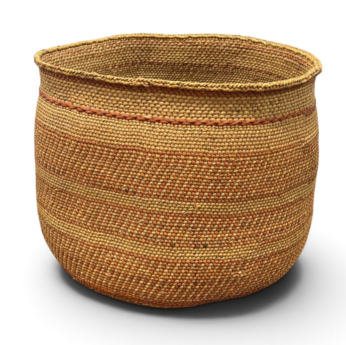 Vintage Woven Iringa Basket: 10.5" H x 12" overall diameter.